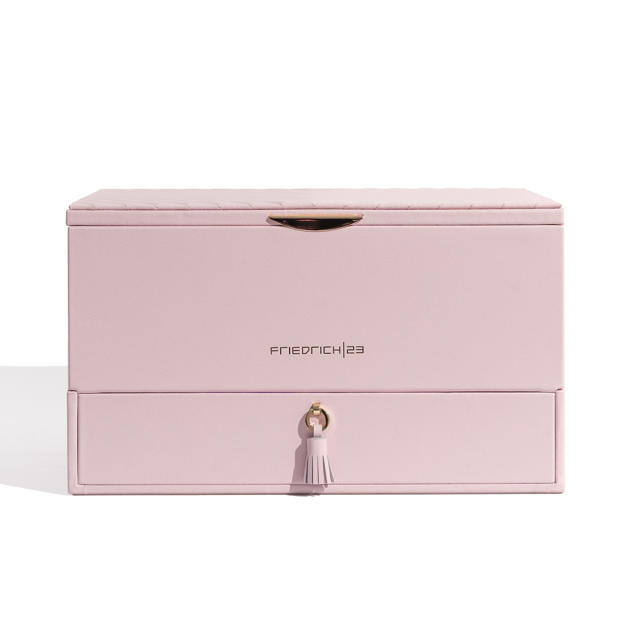 Rosafarbener Schmuckkoffer aus Leder mit Ziernähten und Beschlägen in Goldoptik, Lade mit Zierquaste sowie Friedrich23 Logo in Goldprägung