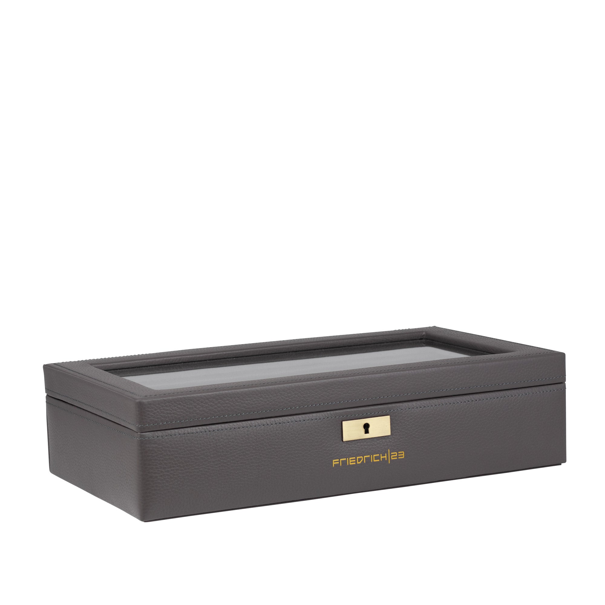 Seitliche Ansicht der grauen Uhrenbox aus Leder mit Glaseinsatz im Deckel, genarbtes Leder mit grau abgesetzten Nähten und Metallschloss und Metalllogo